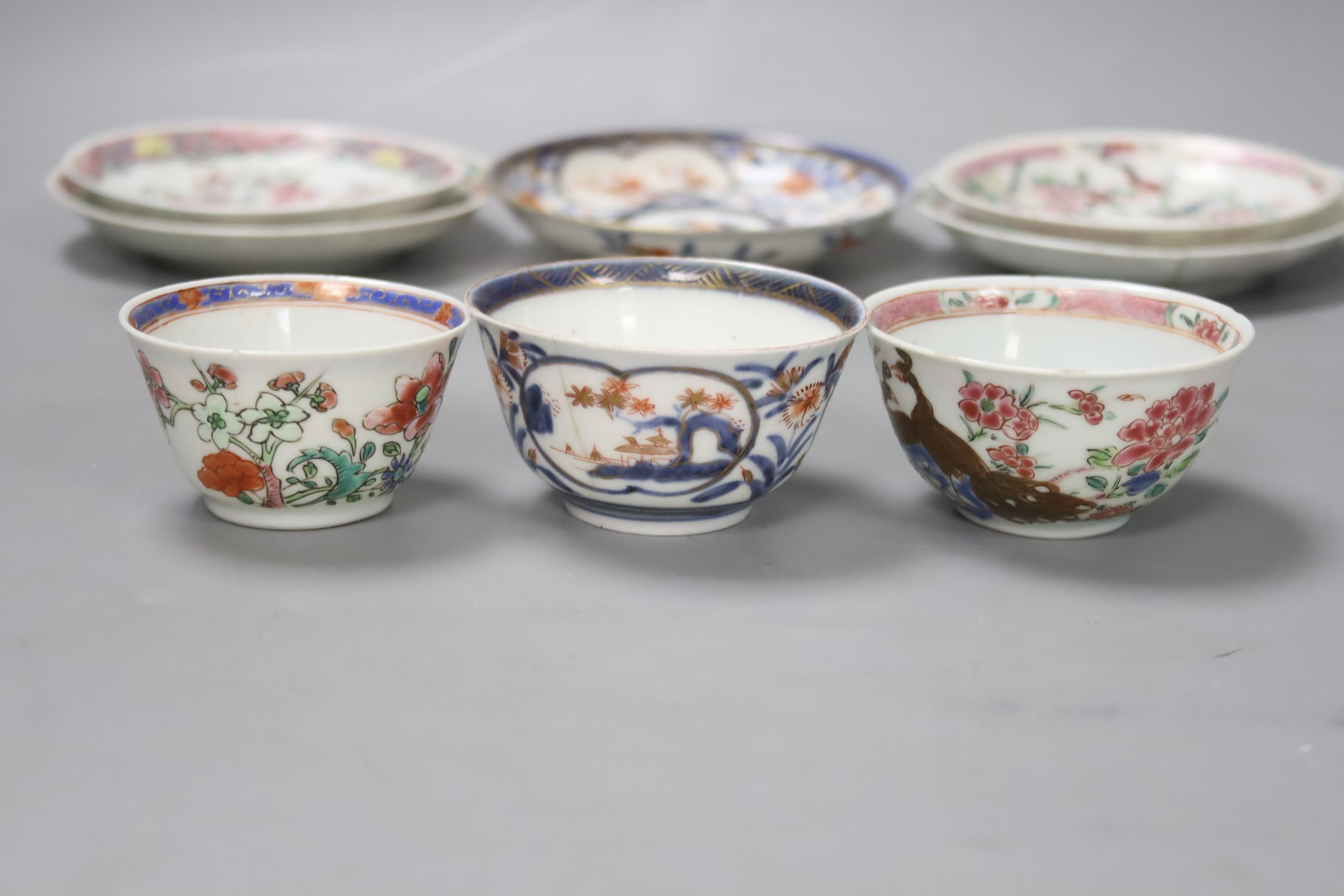 Three 18th century Chinese famille rose or Imari tea bowls together with five saucers